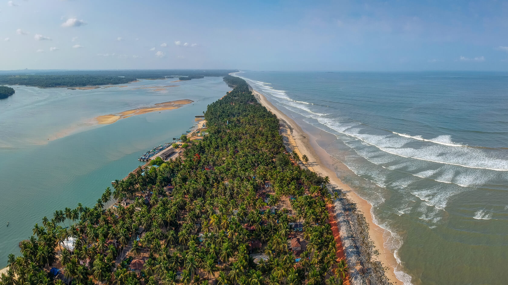 An aerial panoramic view of the Kodi Bengare/Delta beach, near Udupi, Karnataka.