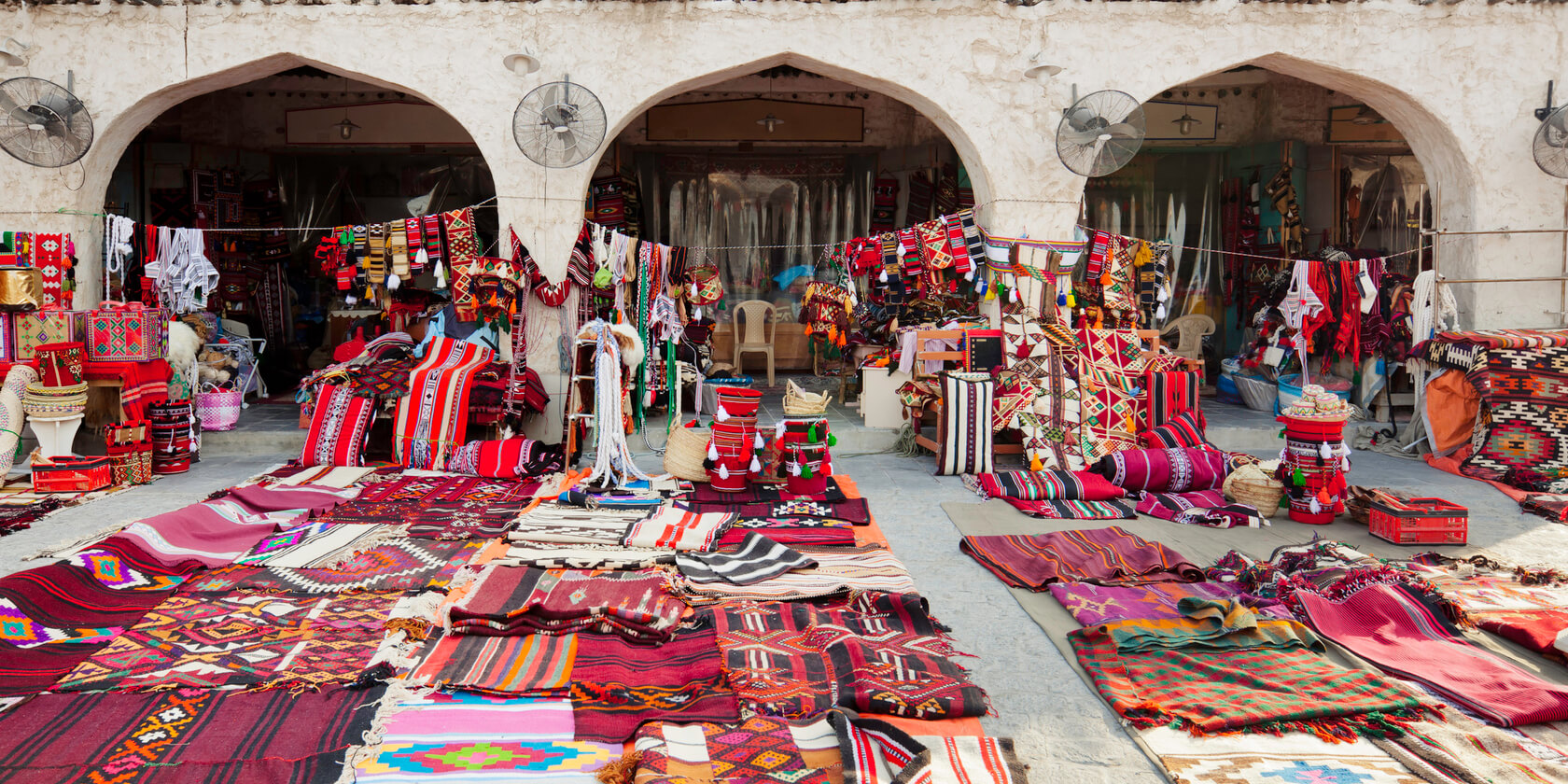 Textile shop along the street in the Souq Waqif area in Doha, Qatar.