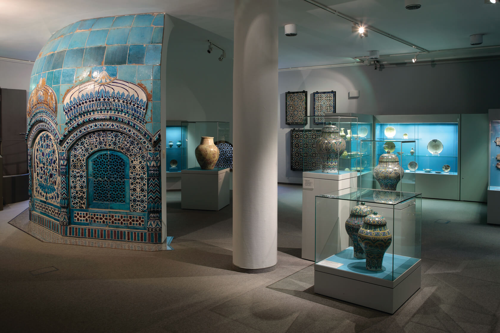 A museum showing ancient pottery and tile work