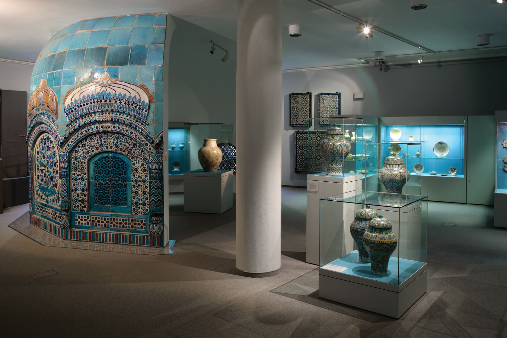 A museum showing ancient pottery and tile work